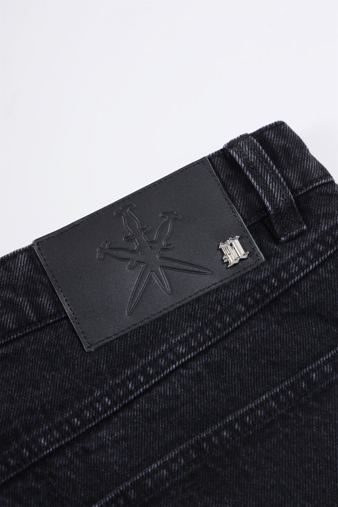 UNKNOWN Black Jorts Cross patched